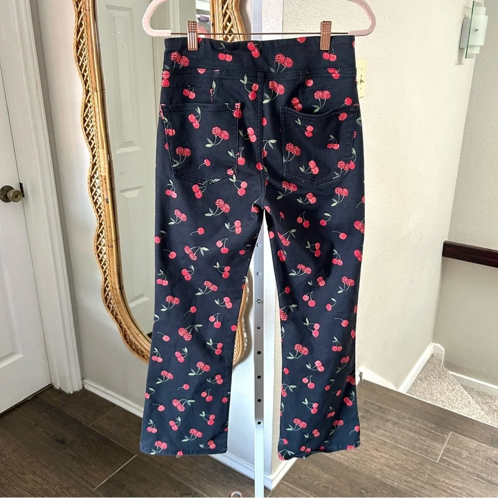 Free People / NWT Cherry Fruit Print Flare Crop Pants in Black